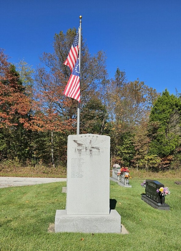 Military memorial at Talbott Cemetery with American flags